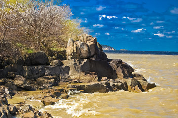 Obraz premium Spring on the granite rock on the bank of Dnieper