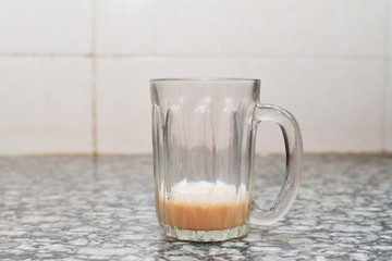 Unfinished Teh Tarik Or Pulled Tea a famous sweet milk tea in Malaysia.