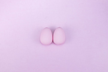Flat lay of Easter eggs mockup background, view from above with copy space for text.pink concept of stylish