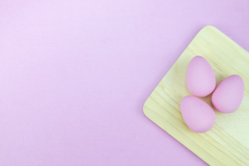Flat lay of Easter eggs mockup background, view from above with copy space for text.pink concept of stylish