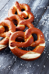 German pretzels with salt close-up on the table.