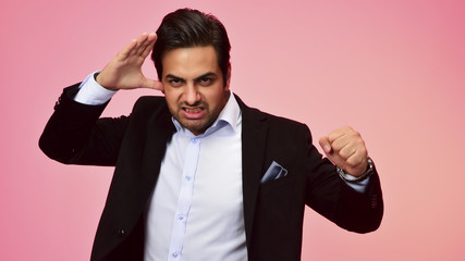Mad Arab businessman ready for a fight. emotions concept. isolated