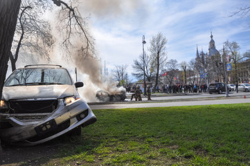 a burning car after a serious accident