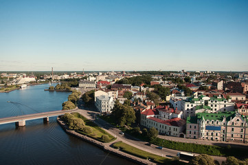 Fototapeta na wymiar VYBORG, RUSSIA View of Vyborg Township with the river. Vyborg stands at the head of Vyborg Bay of the Gulf of Finland, 113 km northwest of St. Petersburg.