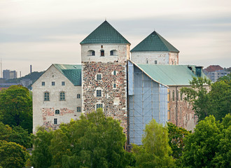 Fototapeta na wymiar Turku Castle (Turun linna), medieval building in city of Turku in Finland. Dawn