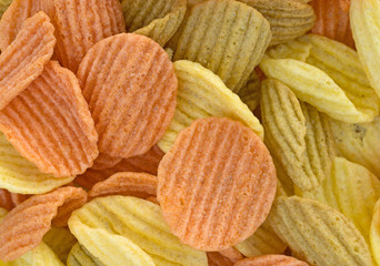 Close of colorful vegetable chips seasoned with sea salt.