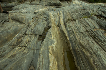 part of the rock surface in the waterfall area