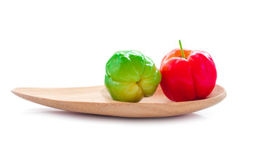 Acerola fruit close up on background.