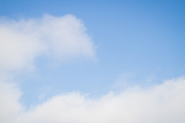 Blue sky with white clouds in the winter air