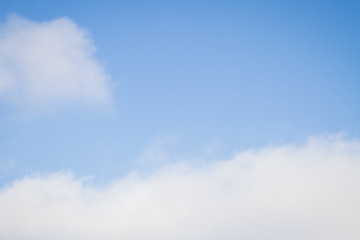 Blue sky with white clouds in the winter air