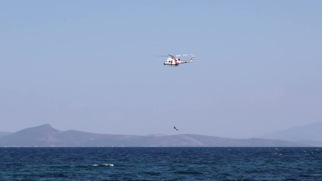 Rescue Helicopter is holding diver