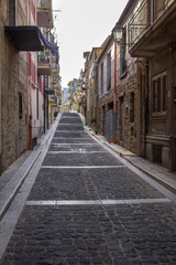 Narrow street of Lascari in Sicily, Italy