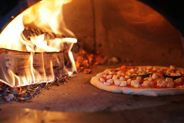Neapolitan pizza in a wood stove