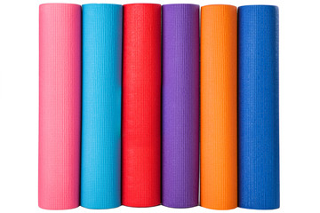 set of multi-colored rugs for sport on a white background, for yoga, tourism, active lifestyle