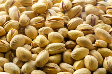 Pistachio nuts. A close-up photograph. Unrefined whole kernel 