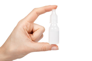 Medical eye dropper bottle, container with liquid in hand. Isolated on white background. Medicine solution