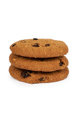 Home made oragnic chocolate chips cookies with raisins and pumpkin seeds. Isolated on white background