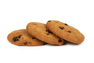 Home made oragnic chocolate chips cookies with raisins and pumpkin seeds. Isolated on white background