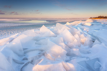 Ice floe on the beach in the village of Chalupy in the Poland.