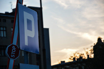 city sign with sky background, parking sign