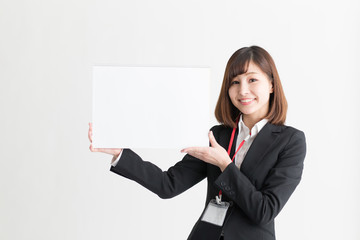 Naklejka premium スーツ・女性(白バック)