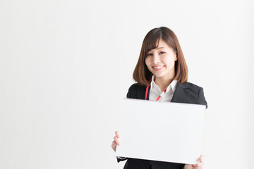 Naklejka premium スーツ・女性(白バック)