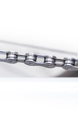 New and clean silver mountain bike chain detail for wallpaper or background