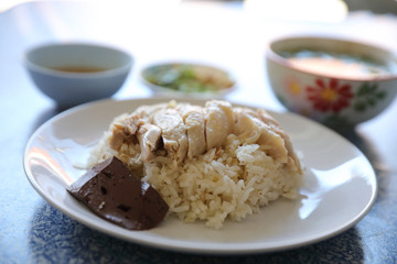 Hainanese chicken rice with cucumber in closeup , Thai food