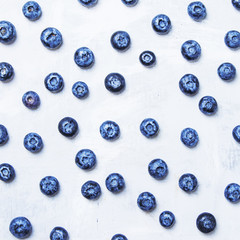 Fresh blueberries on light background, top view