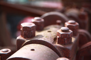Rusted nuts and bolts on a machine