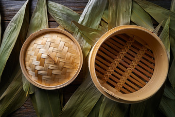 Asian kitchen bamboo steamer for steam cooking - obrazy, fototapety, plakaty
