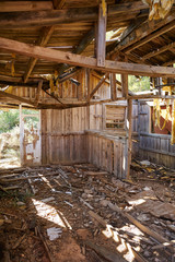 Old wooden cabin house destroyed by hurricane