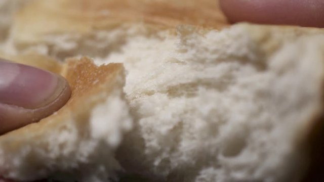 Slow Motion of Jesus tearing bread for the apostles. Passion style footage of Easter scenes