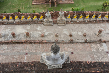 Old Buddha statue in temple at Ayutthaya, Thailand.