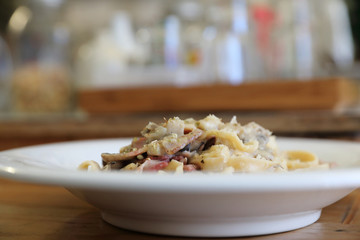 pasta fettuccine alfredo white sauce with ham bacon and mushroom