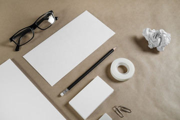 Template for branding identity. Blank stationery set on craft paper background. Objects for placing your design.