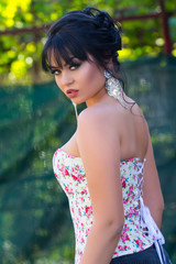 Obraz premium Portrait of beautiful girl with an evening make-up, close-up