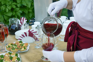 Woman serving wine