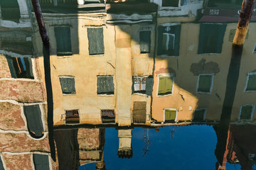 Reflection of Italian Building on Water 