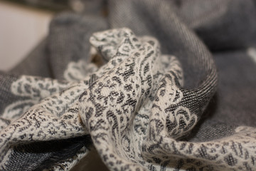 Fototapeta na wymiar Multi-colored woolen scarf for women. Background. Texture.