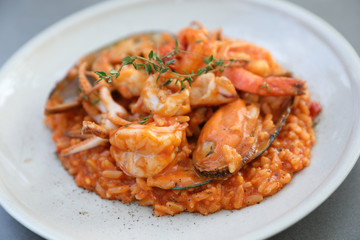 seafood risotto with mussel shrimp and squid , italian food