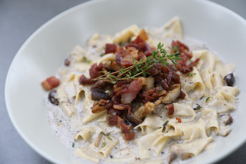 pasta fettuccine alfredo white sauce with ham bacon and mushroom