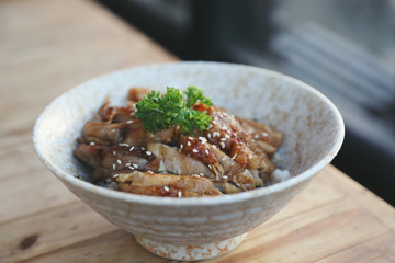 japanese food , Chicken teriyaki with rice on wood background