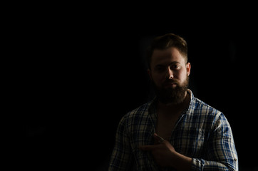 Fototapeta na wymiar Studio shot of a handsome stylish man with beard