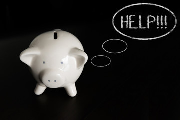 Piggy bank with thought bubbles, thinking HELP