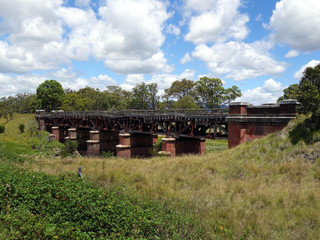 Fototapeta na wymiar An dilapidated old railway bridge in northern rural New South Wales, Australia