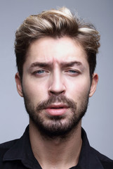 Fototapeta premium thoughtful businessman holding his hand under his chin