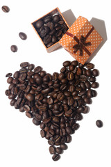 Heart made of coffee beans and a gift box filled with grains