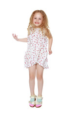 Little girl is jumping.