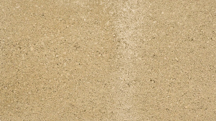 Fototapeta premium Beige-yellow plaster wall, background, texture.